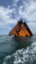 Old rusty sunken ship at sea Royalty Free Stock Photo