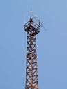 Old rusty tall antenna tower
