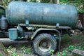 Old rusty tank on a truck Royalty Free Stock Photo