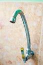 Old rusty tap leaking water Royalty Free Stock Photo