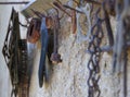 Old rusty tool on an old hanger hook