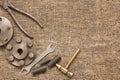 Old rusty tools and details on the rough fabric Royalty Free Stock Photo