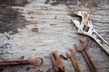 Old rusty tools on old wood background. wrench on wooden. rustic styles. Royalty Free Stock Photo