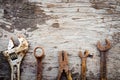 Old rusty tools on wooden background. vintage styles Royalty Free Stock Photo