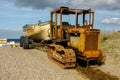 Old Rusty tractor on beach