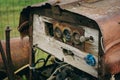 Old rusty tractor or car with handmade cheap instrument cluster Royalty Free Stock Photo