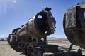 old rusty trains at the antique train cemetery close to the salt flats of Uyuni in Bolivia. Royalty Free Stock Photo