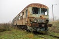 Old rusty trains. Old abandoned track, siding with dirty old trains. Royalty Free Stock Photo