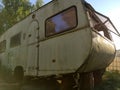 old rusty travel trailer. camper van, caravan Royalty Free Stock Photo