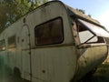 old rusty travel trailer. camper van, caravan Royalty Free Stock Photo