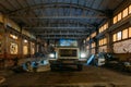 Old rusty truck in abandoned factory warehouse