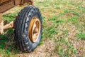 Old Rusty Truck Wheel And Rubber Tire.