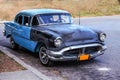 Old and rusty vintage american car of 1950s. Royalty Free Stock Photo