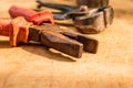Old rusty, vintage pliers with pincers in the back, blurry. Generally, pliers consist of a pair of metal first-class levers