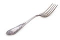 Old rusty vintage silver fork isolated on a white background, close up Royalty Free Stock Photo