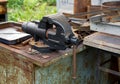 Old rusty vise on workbench