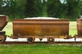 Old rusty waggon full of slate