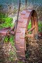 Antique rusty farm implement wheel