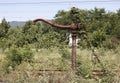 Old rusty water pump for locomotives Royalty Free Stock Photo