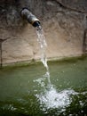 Old rusty water tap in garden Royalty Free Stock Photo