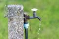 A old rusty water tap in garden Royalty Free Stock Photo