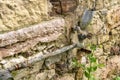 Old rusty water valve with pipes Royalty Free Stock Photo