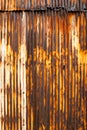 Old rusty wavy metal plate wall