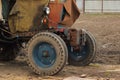 old rusty weathered tractor close up in a yard Royalty Free Stock Photo