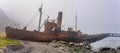 Old, rusty whaling ships and processing facilities at a now abandoned whaling station in Grytviken -on South Georgia island Royalty Free Stock Photo