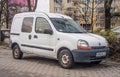 Old rusty white French van Renault Kangoo parked