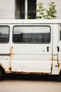 Old rusty white van