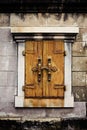 Old rusty window with iron railings. Royalty Free Stock Photo