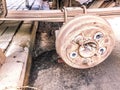 Old rusty worn drum brakes of a truck, car. Automotive suspension repair. Replacing wheel