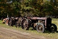 Row of old rusty tractors Royalty Free Stock Photo