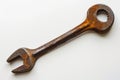 An old rusty wrench on a white surface. Useful for industrial themes Royalty Free Stock Photo