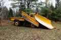 Old rusty yellow snow plow