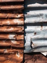 Old and rusty zinc sheet wall. Vintage style metal sheet roof texture. Pattern of old metal sheet. Rusting metal or siding. Royalty Free Stock Photo