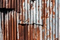 Old and rusty zinc sheet wall. Vintage style metal sheet roof texture. Pattern of old metal sheet. Rusting metal or siding. Royalty Free Stock Photo