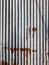 Old and rusty zinc sheet wall. Vintage style metal sheet roof texture. Pattern of old metal sheet. Rusting metal or siding. Royalty Free Stock Photo