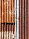 Old and rusty zinc sheet wall. Vintage style metal sheet roof texture. Pattern of old metal sheet. Rusting metal or siding. Royalty Free Stock Photo