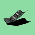 Old 90s classic analog mobile flip phone Royalty Free Stock Photo