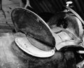 An old saddle in the barn from J. G Harris saddle maker from Greely Co. Royalty Free Stock Photo