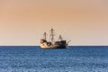 Old Sailboat sailing under a Caribbean sunset Royalty Free Stock Photo