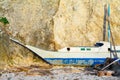 Old sailing boat on repair near tropical rocks Philippines