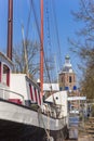 Old sailing ship and church tower in Meppel