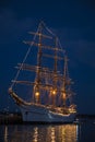 Old Sailing Ship Lit up in Midnight Blue Sky