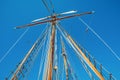 Old sailing ship wood mast, rigging of a sailing ship detail