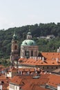 Old Saint Nicholas church with clock tower in Prague, Czech Republic. Cityscape view of Prague old town, high view point Royalty Free Stock Photo