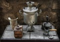 Old samovar, coffee grinder, oil lamp, coffee maker Royalty Free Stock Photo