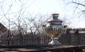 Old samovar on grungy wooden table